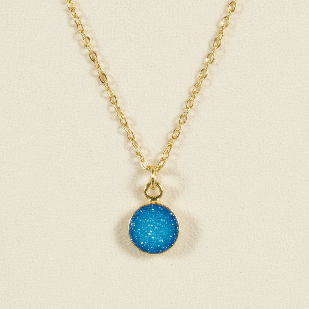 Gold chain druzy pendant necklace with round aqua blue stone