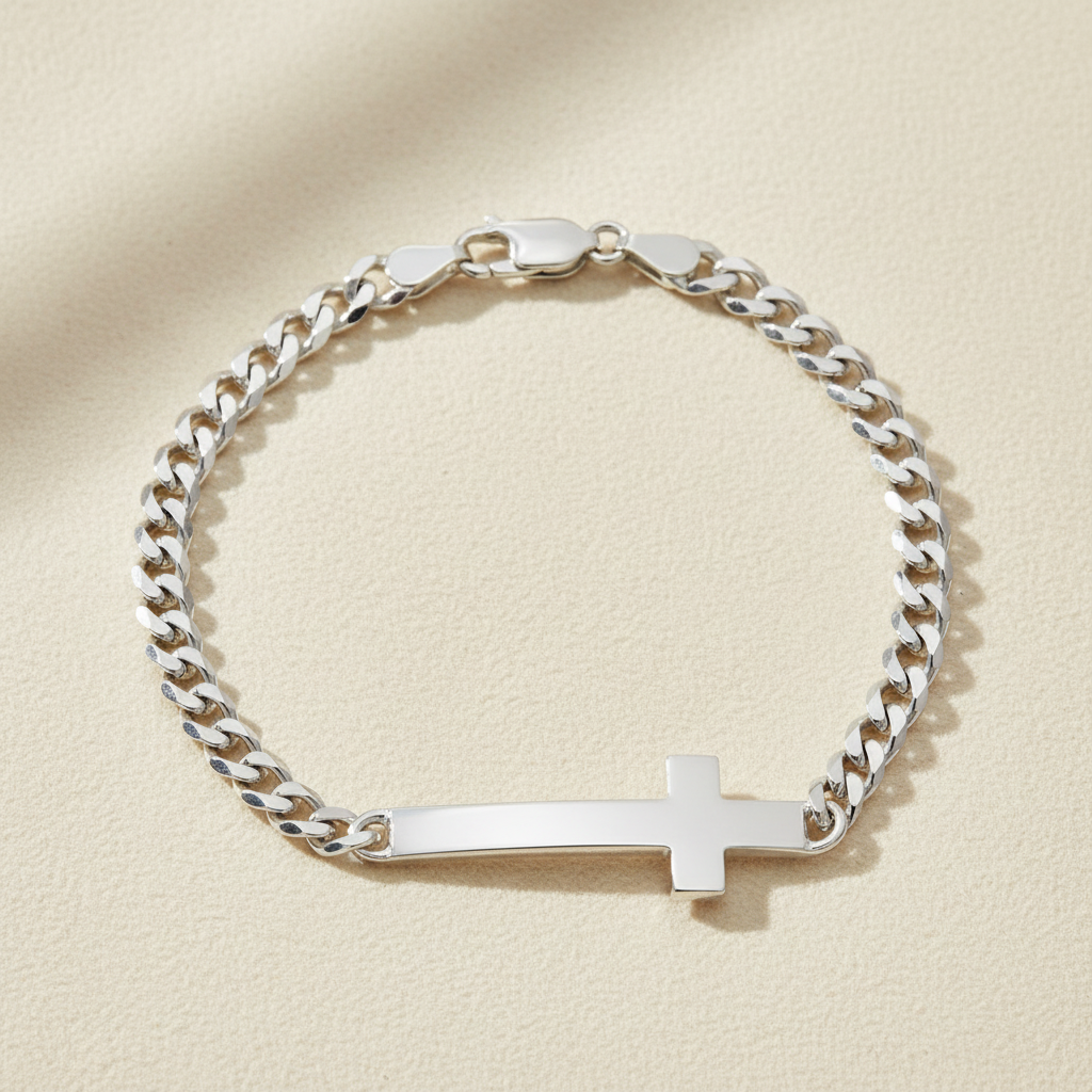 Silver chain bracelet with sideways cross charm and lobster clasp