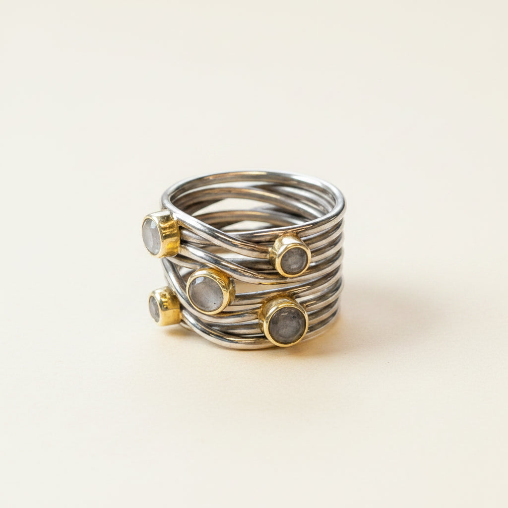 Gunmetal tone sterling statement ring with spiral wire bands and bezel-set round stones