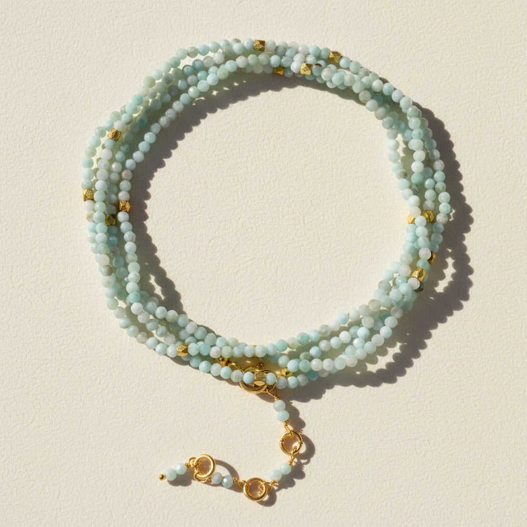 Light aqua bead wrap bracelet/necklace with gold charms and clasp