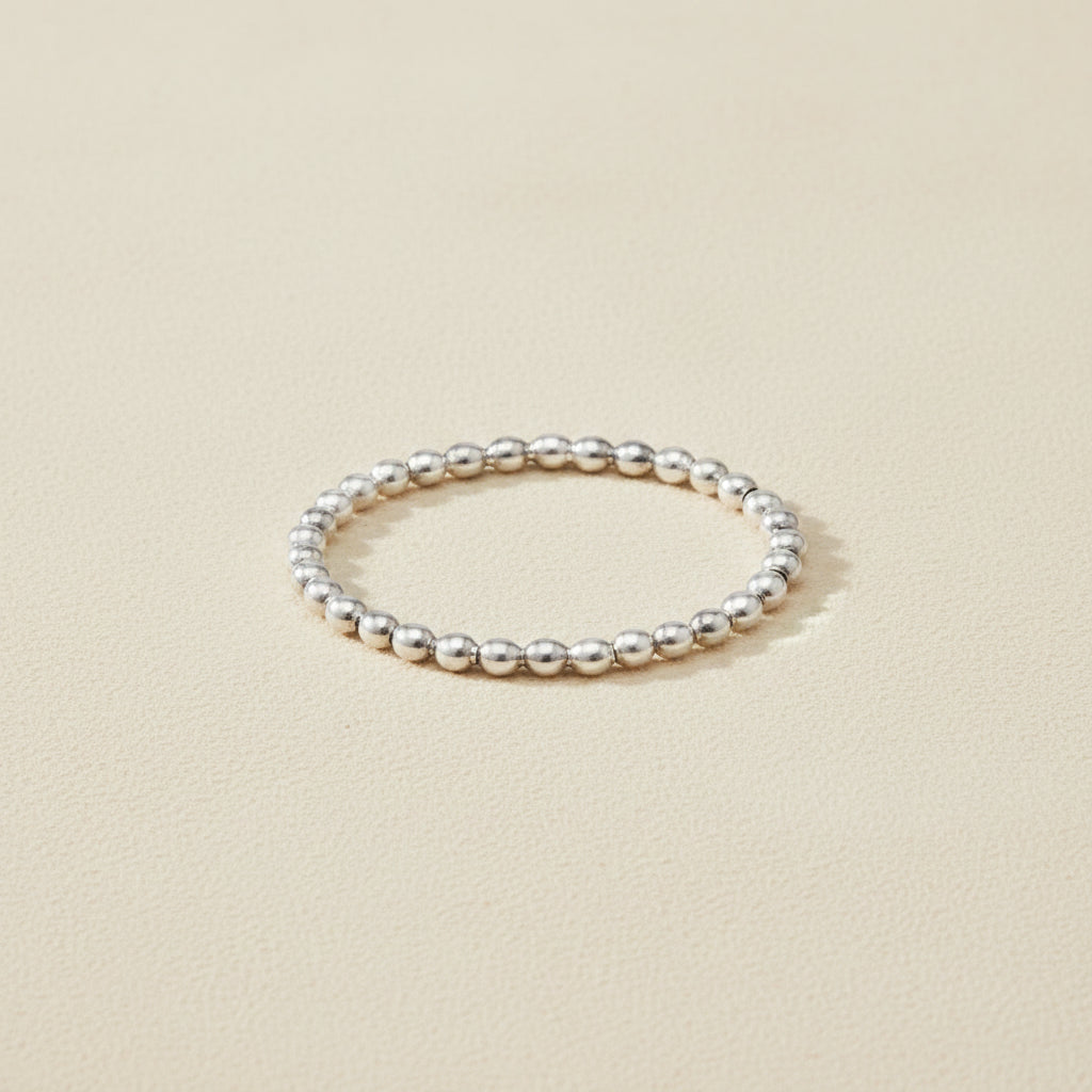 Silver beaded dot ring with evenly spaced round ball links