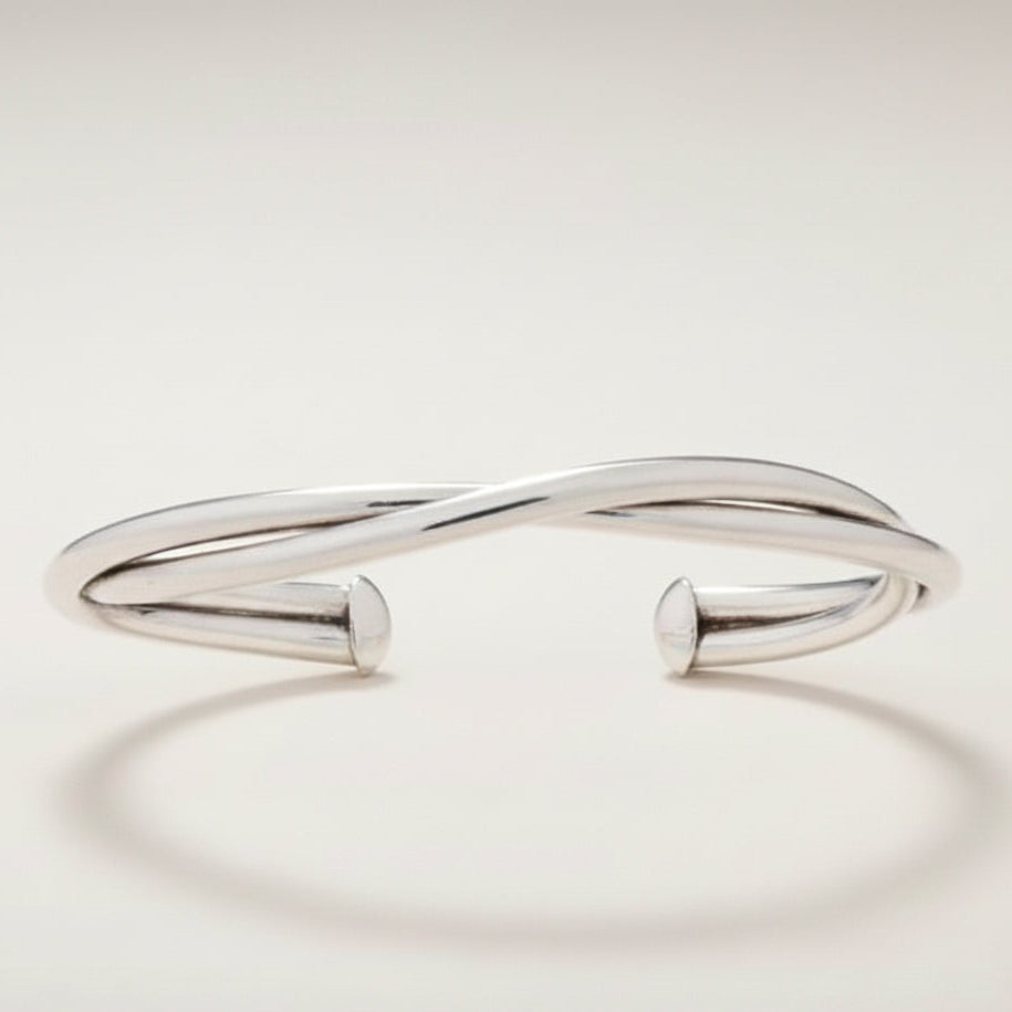 Silver twisted tube hammered cuff bracelet with open ends