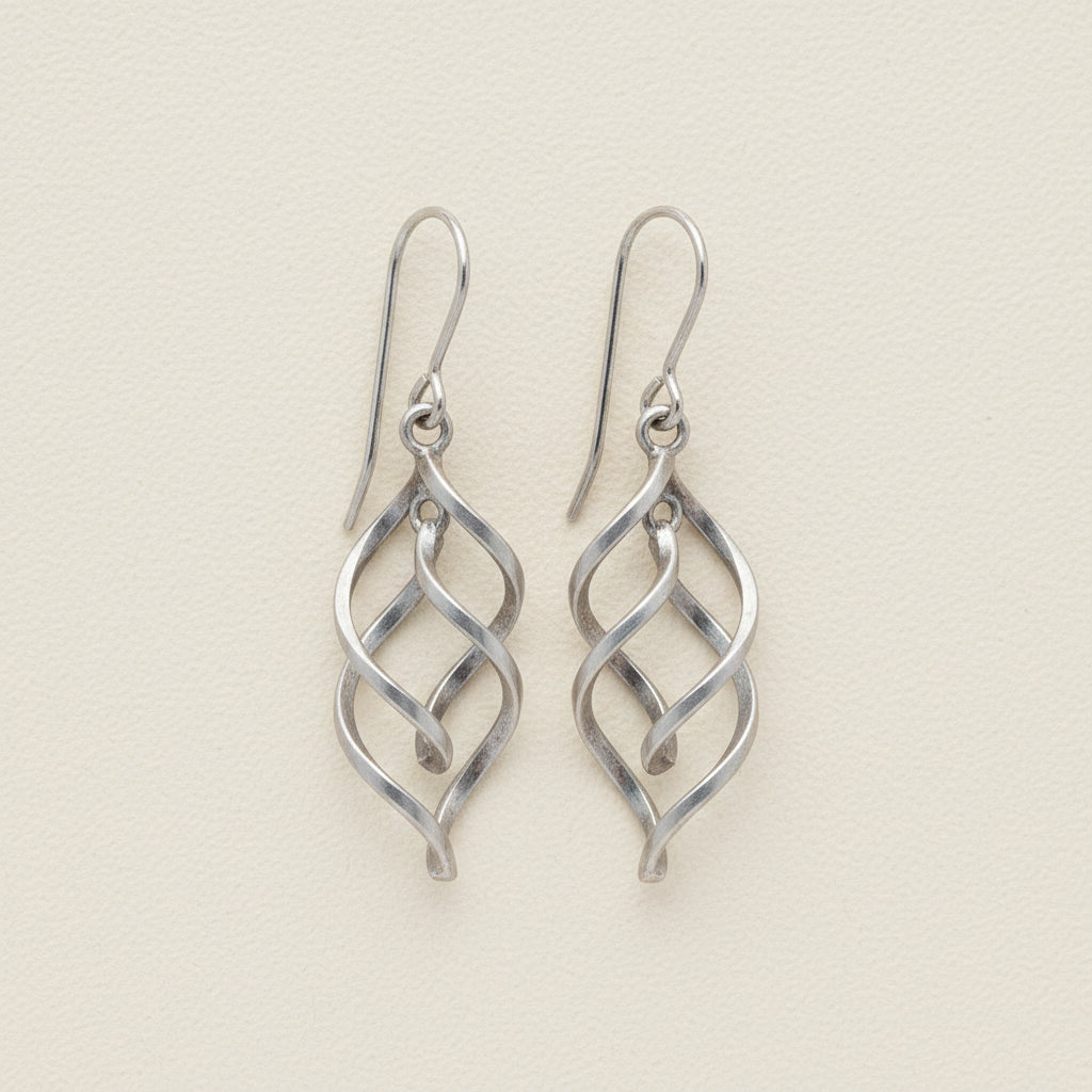 Silver-tone ribbon dangle earrings with open spiral scroll design and fishhook backs