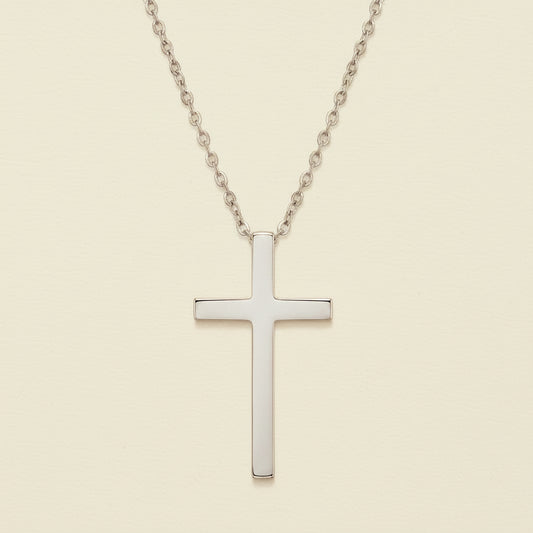 Dainty cross necklace with silver-tone cross pendant on a chain