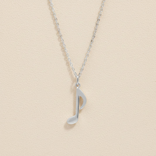 Silver-tone chain necklace with quarter note charm pendant