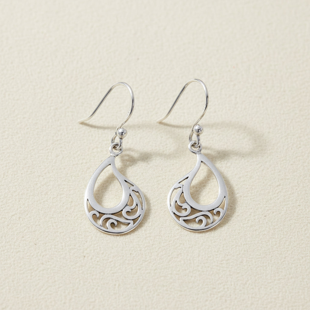 Silver teardrop filigree dangle earrings with looped hooks and small bead