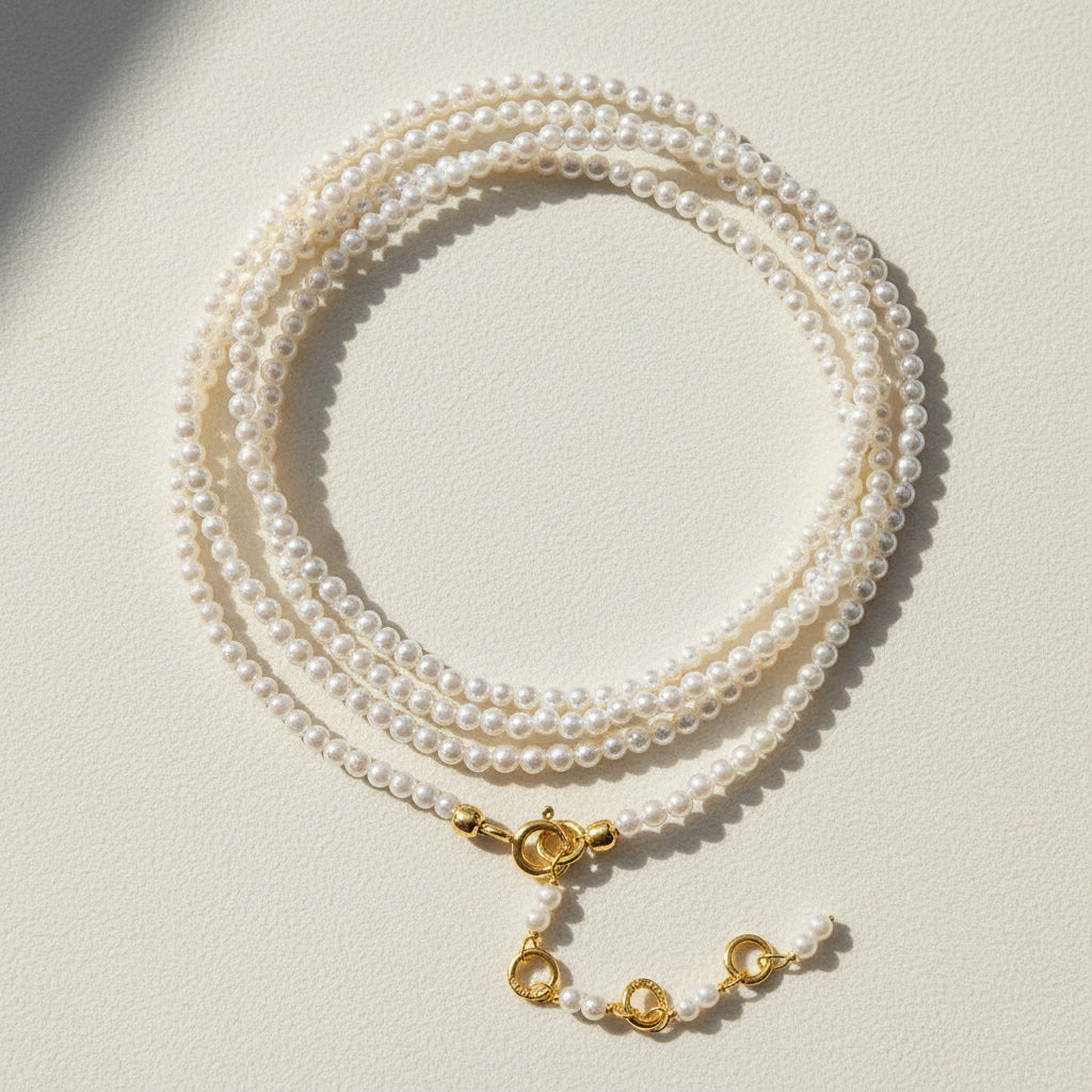 Freshwater pearl wrap bracelet/necklace with gold clasp and layered pearl strands