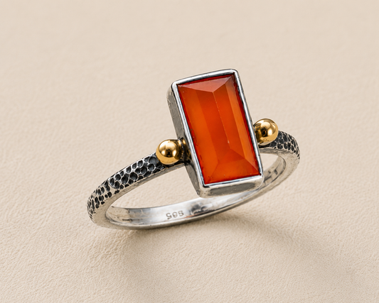Carnelian orange rectangular stone ring, silver textured band, gold bezel side knobs
