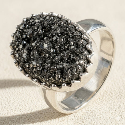 Large oval druzy ring with black glitter stone and silver band