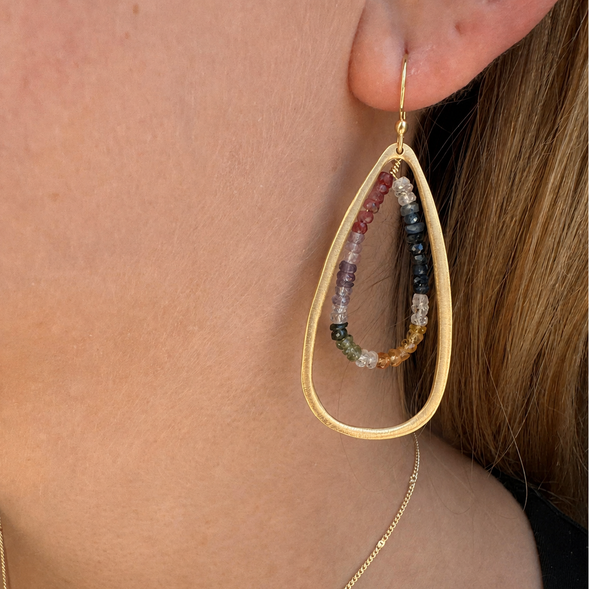 Gold-tone teardrop earrings with multicolor bead drop and hook closure