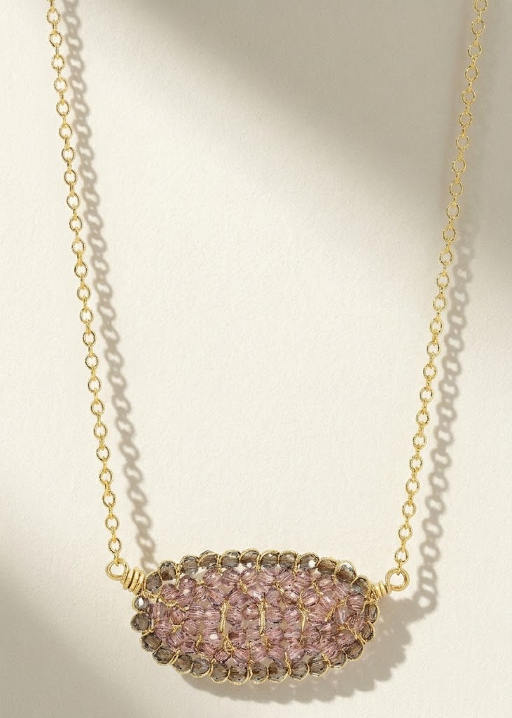 Gold chain necklace with oval pink pavé pendant