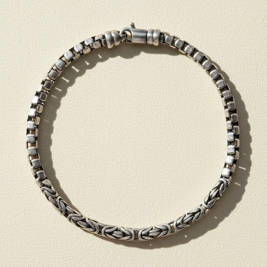 Silver-tone box and byzantine chain bracelet with interlocking rectangular and twisted links