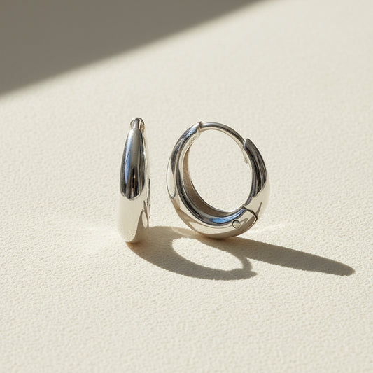 Silver teardrop huggie hoop earrings