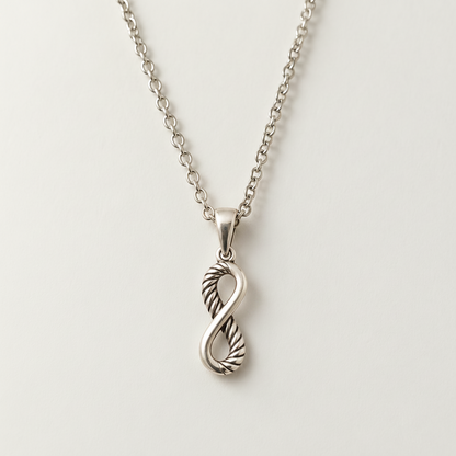 Silver infinity heart pendant necklace with textured twist, cable chain