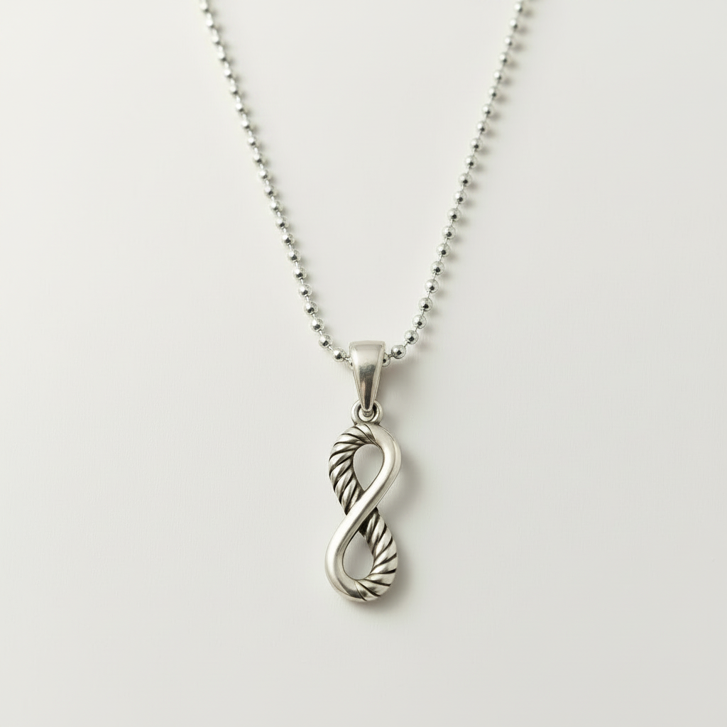 Silver infinity heart pendant on 16 in chain with openwork twist design