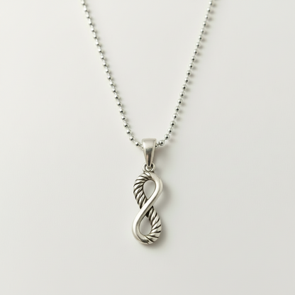Silver infinity heart pendant on 16 in chain with openwork twist design
