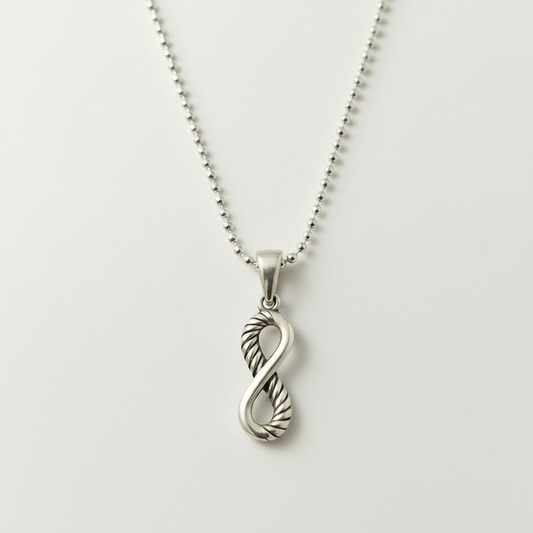 Silver infinity heart pendant on 16 in chain with openwork twist design