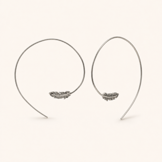 Silver feather pull-through hoop earrings with dangling feather charms