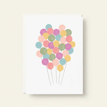 Balloons mini greeting card with pastel balloon cluster and thin string stems