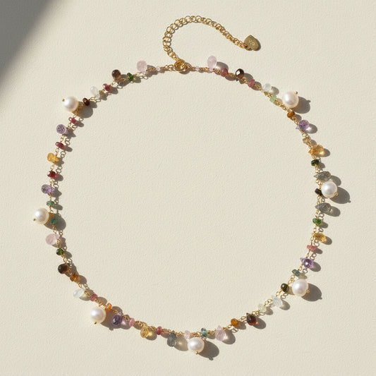 Gold-tone freshwater pearl choker necklace with multicolor beads and dangling charms
