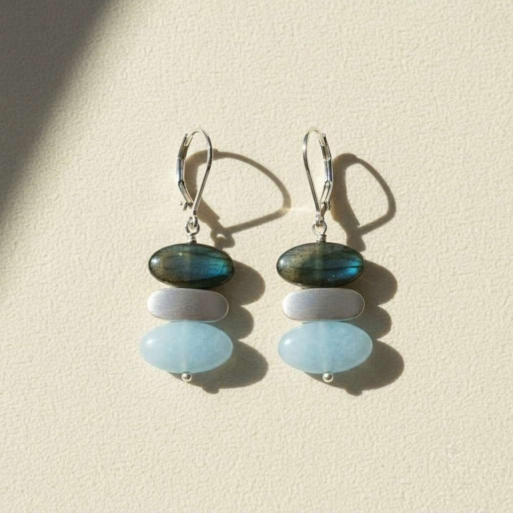 Oval gemstone drop earrings with silver-tone hooks and two stacked oval blue-green stones