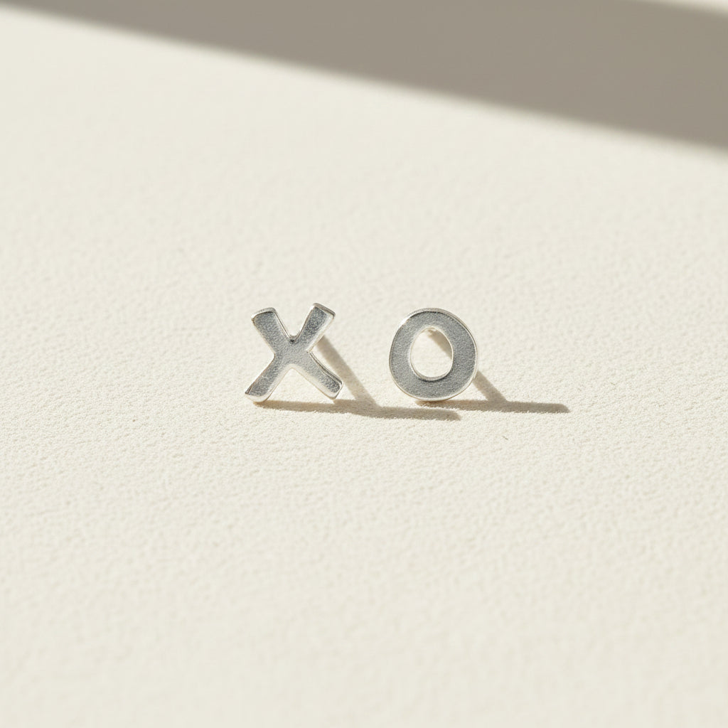 XO stud earrings with X and O metal letters, silver-tone finish