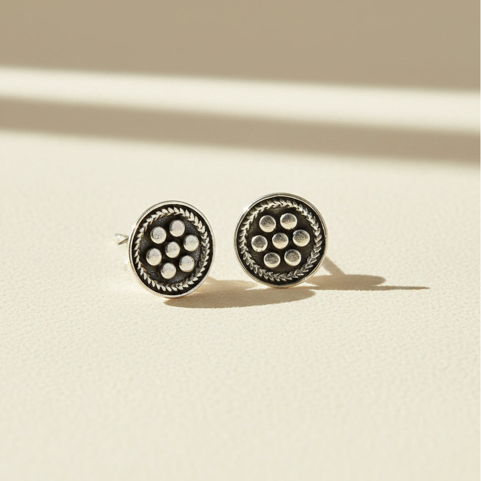 Silver-tone beaded circle stud earrings with six pearl-like dot accents