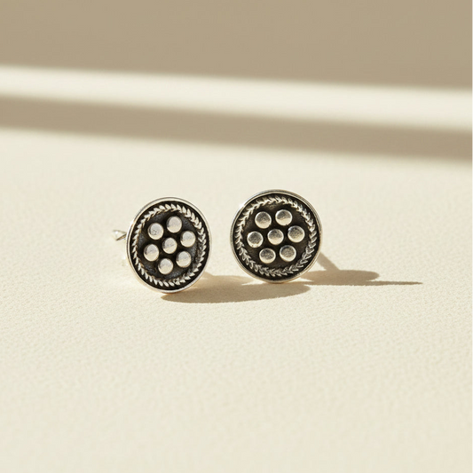 Silver-tone beaded circle stud earrings with six pearl-like dot accents