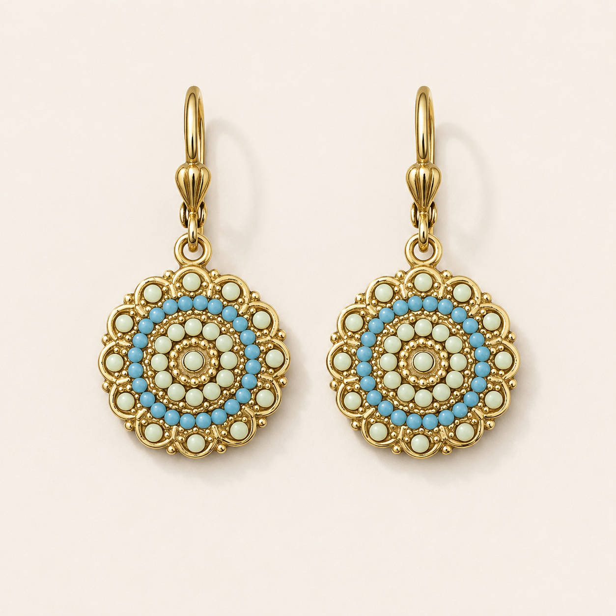 Gold-tone Dahlia drop earrings with blue and white beaded floral medallion
