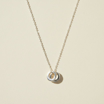 Two-circle pendant necklace with silver-tone linked rings