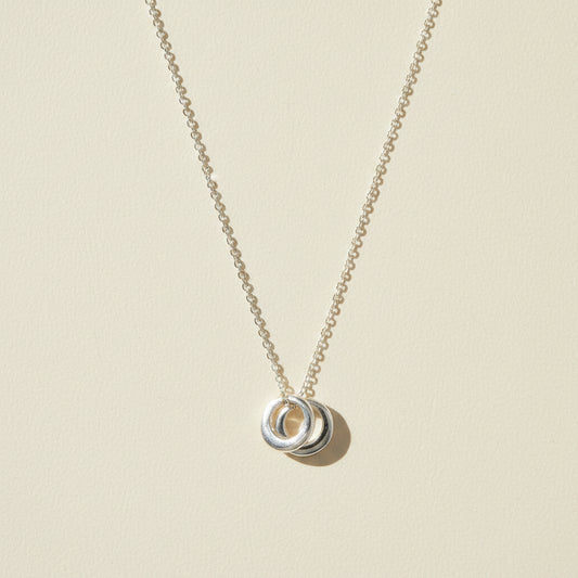 Two-circle pendant necklace with silver-tone linked rings
