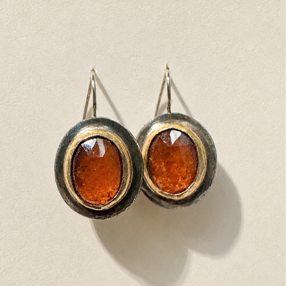 Crescent-rim hook earrings with amber oval cabochon and bronze-toned rim