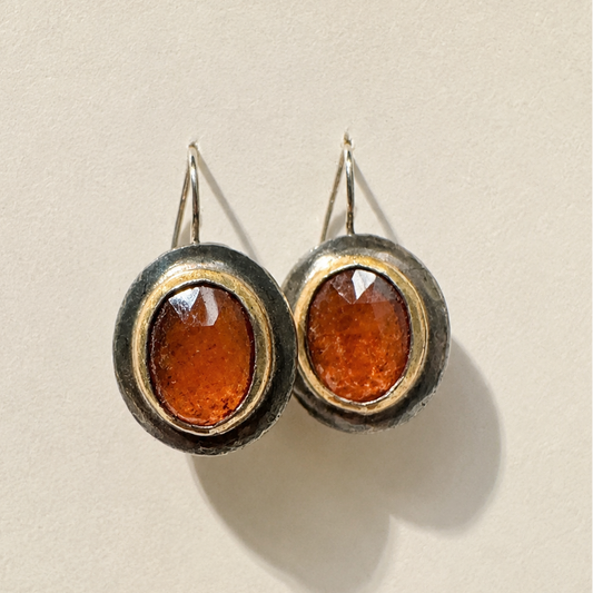Crescent-rim hook earrings with amber oval cabochon and bronze-toned rim