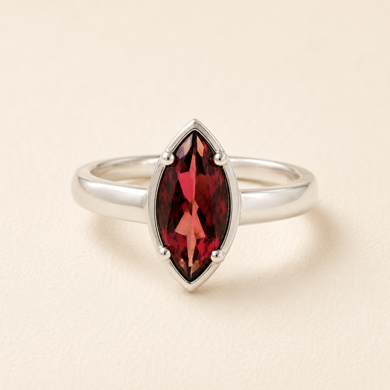 Marquise garnet ring with red marquise gemstone and slim silver band