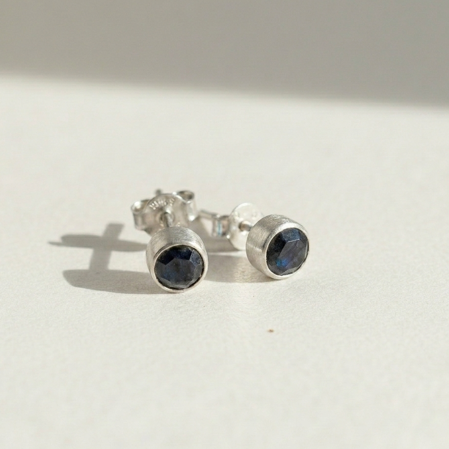 Faceted labradorite stud earrings, round dark blue stones in silver-tone settings