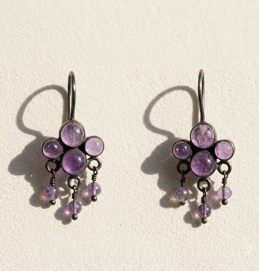 Amethyst cluster dangle earrings with purple round stones and silver-tone hooks