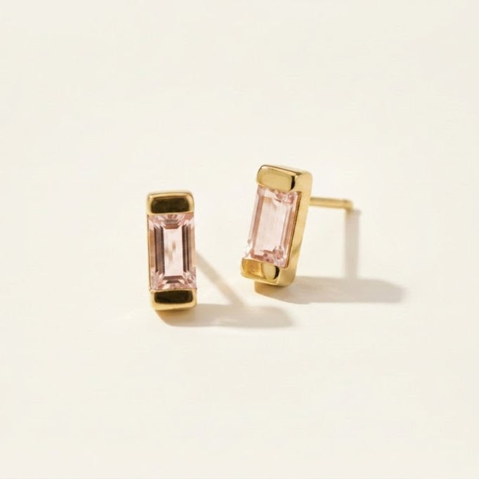 Gold baguette stud earrings with pink amethyst rectangular stones in gold bezels