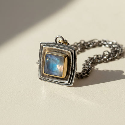 Square moonstone pendant necklace with antique silver square frame and dark chain