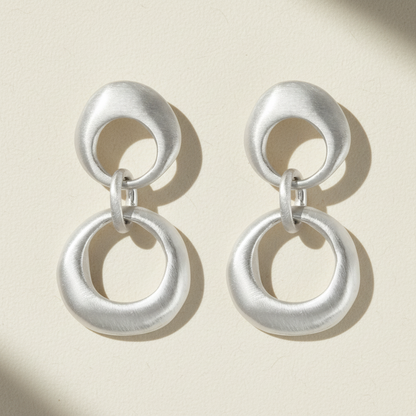 Silver double-circle drop earrings with linked rings
