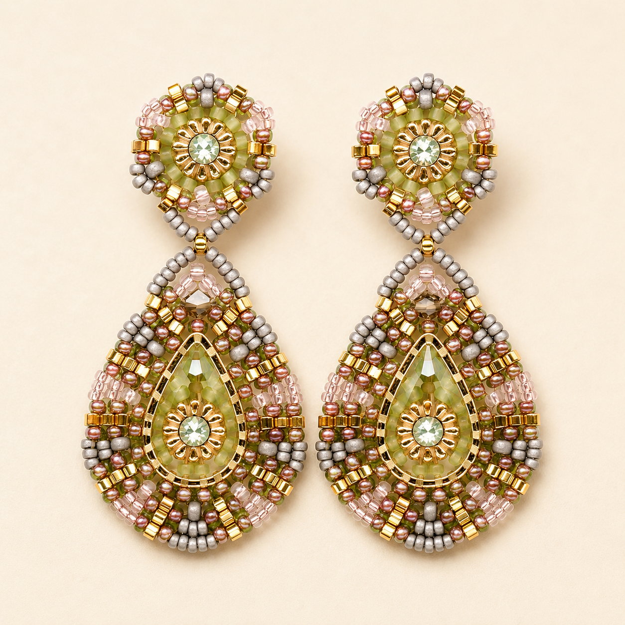 Beaded teardrop post earrings with green, peach, gold and white seed bead details
