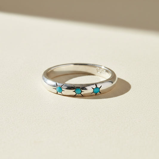 Silver trio ring with three turquoise gemstone accents