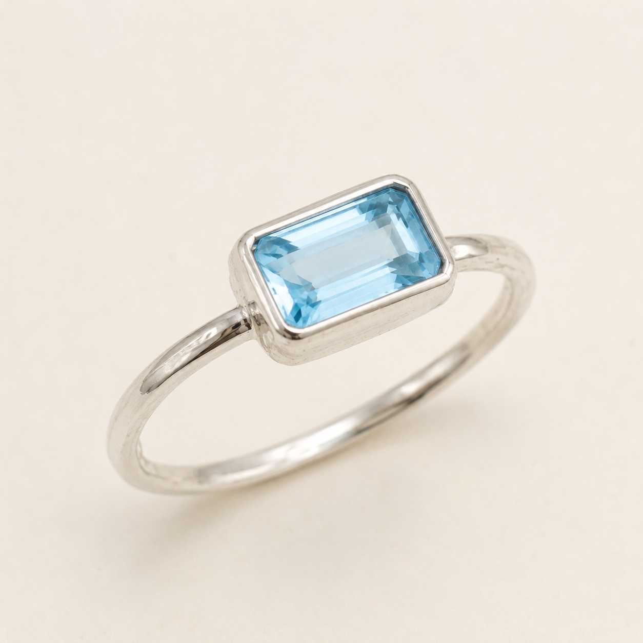 Rectangle blue topaz gemstone ring, faceted rectangular stone in silver-tone bezel
