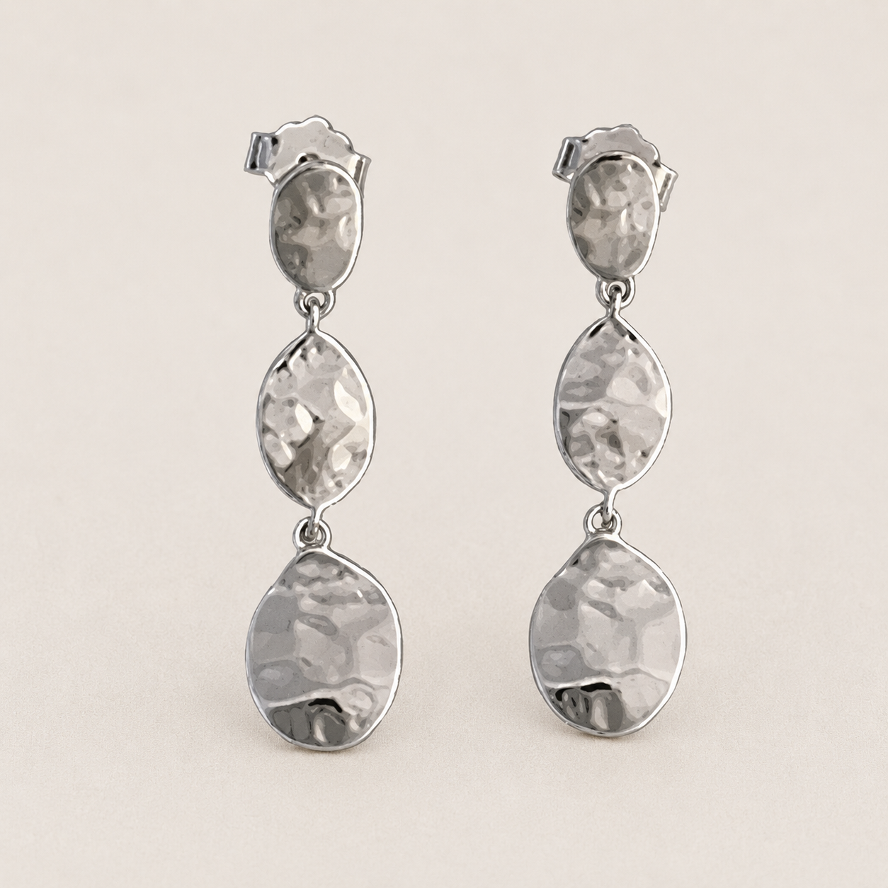 Triple drop post earrings with hammered silver-tone metal teardrops