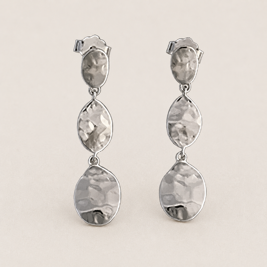 Triple drop post earrings with hammered silver-tone metal teardrops