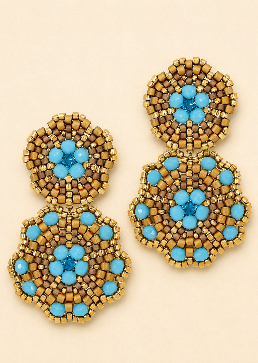 Gold-tone beaded earrings with turquoise double clover flower design