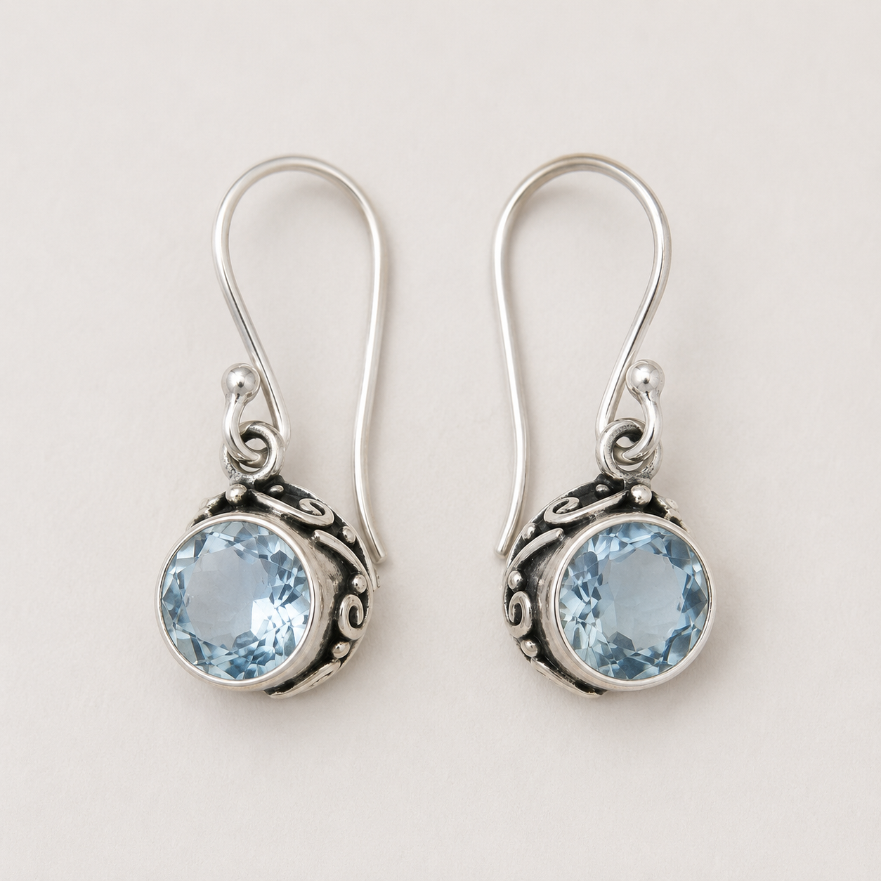 Round blue gemstone filigree drop earrings with silver-tone hooks
