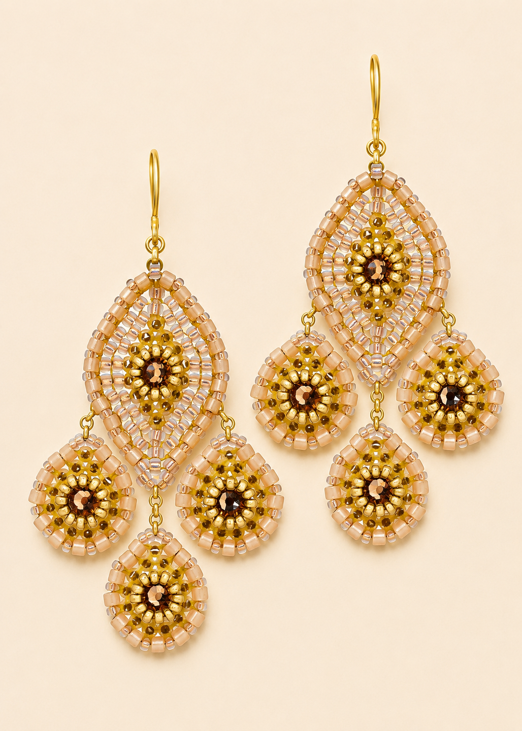 Cream and gold beaded chandelier earrings with round drop charms