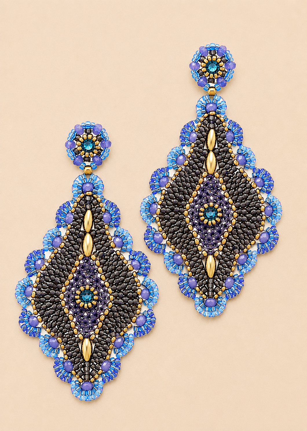 Beaded chandelier earrings with blue and black beadwork, gold drop accents, teardrop fringe