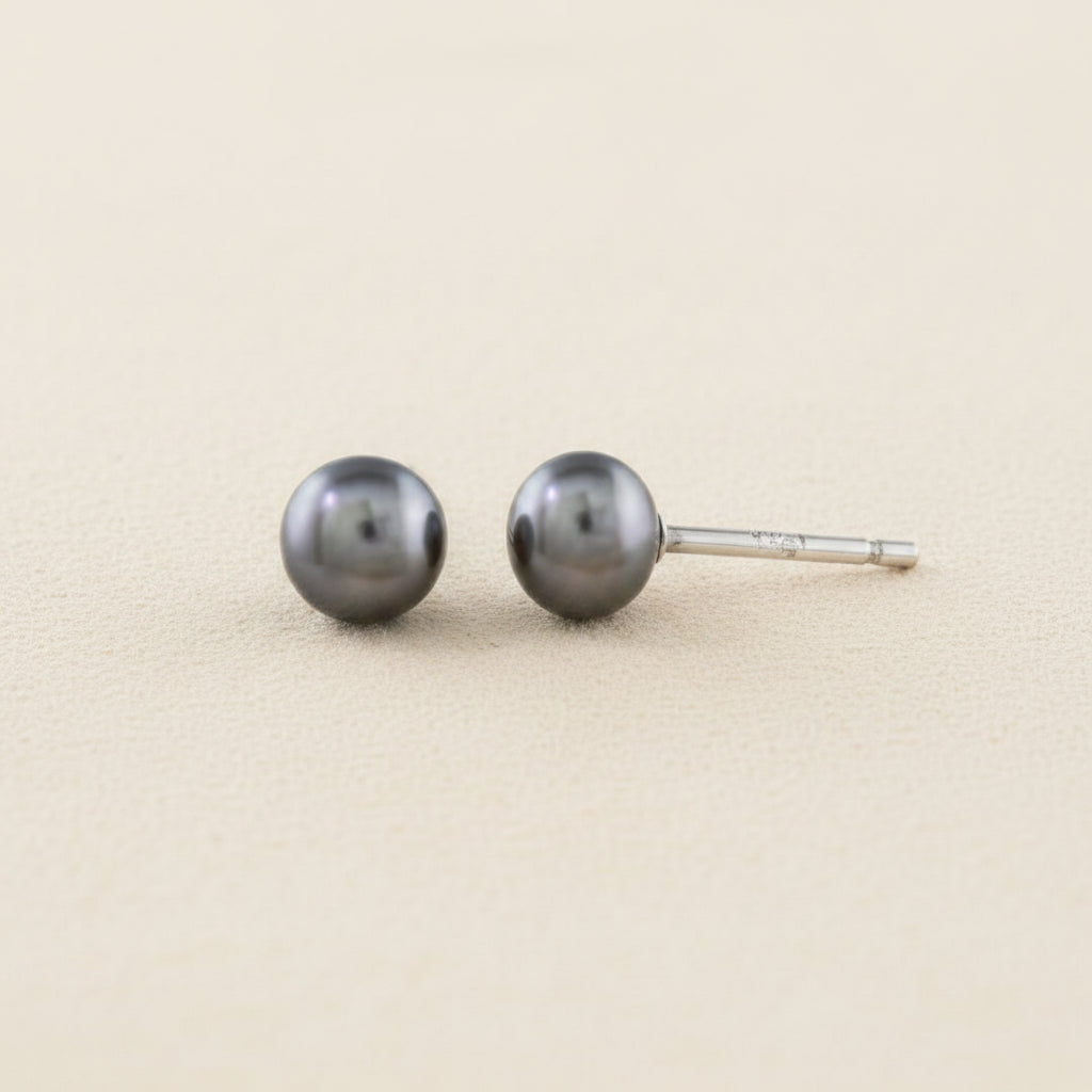 Large gray pearl stud earrings with round pearls and post backs