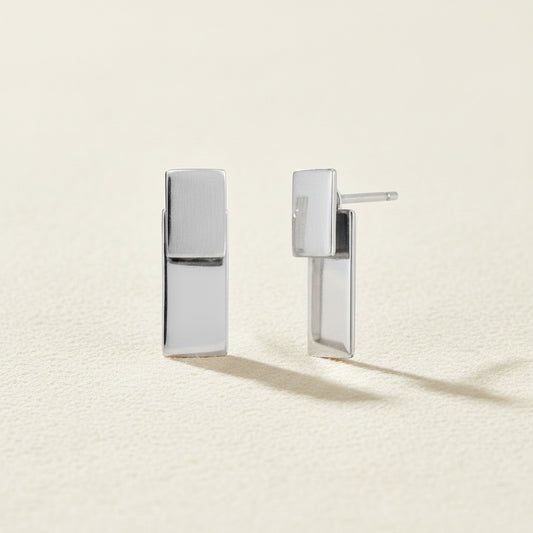 Silver rectangular post earrings with stacked vertical bar design